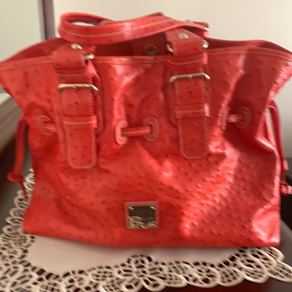 Like new Dooney and Bourke medium chairs bag